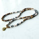 Image of Natural Zebra Jasper Seashell Mala