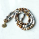 Image of Natural Zebra Jasper Seashell Mala
