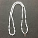 Image of Buddhist Natural White Howlite Lotus Mala of 108 beads