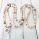 Image of Mala Self Love Natural Rhodochrosite Lotus Mala Third Eye Transcend