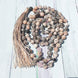 Image of Mala Knotted Rose Quartz and Rhodonite Tassel Mala bead amethyst Third Eye Transcend amazonite mala meditation stone crysal reiki crystal healing bracelet necklace yoga bracelet yoga beads