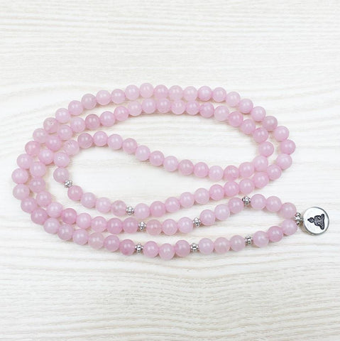Meditating Buddha Mala Bracelet of 108 beads in Natural Rose Quartz